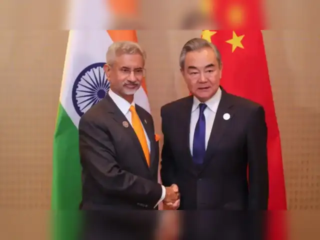 eam holds meeting with chinas wang yi to strengthen bilateral ties