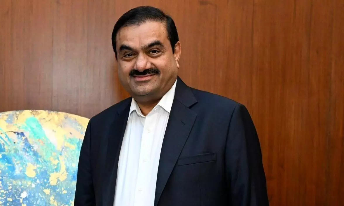 adani reclaims top spot as indias richest person billionaire count reaches record high